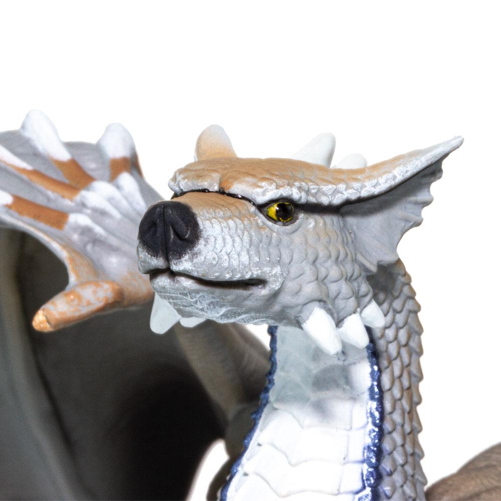 Wolf Dragon toy with wolf-like face and dragon scales, wings folded, prowling with a raised forepaw in gray and blue tones.