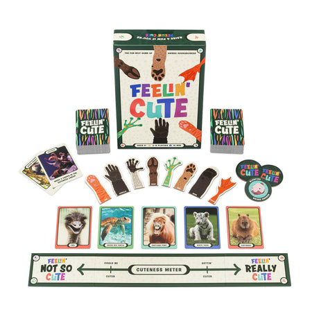 Feelin' Cute game with animal cards, paw tokens, and a cuteness meter for 2-8 players ages 6+ in a friendly showdown.