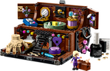 Miniature toy trunk house with detailed rooms, accessories, Thing and Enid Sinclair minidolls for imaginative play.