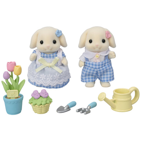 Blossom Gardening Set with Flora Rabbit siblings, interchangeable flower ears, tulips, tools, and watering can accessories.