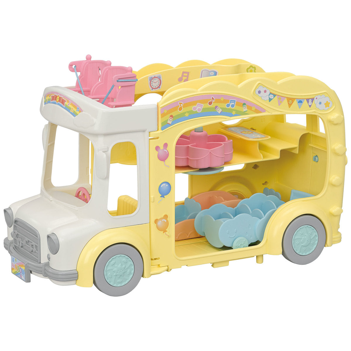 Yellow and white triple-decker nursery bus toy with pastel seats and musical notes decorating the sides