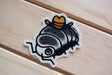 Colorful 3-inch vinyl sticker of a bug wearing a cowboy hat on a wooden surface, weatherproof and semi-matte finish