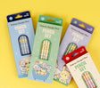Pokemon Pencil Set packages with colorful character themed pencils on a yellow background