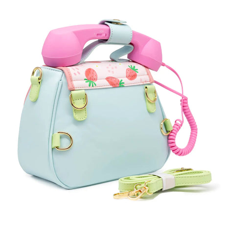 Handbag | Ring Ring Phone Strawberry Fields with pink retro handset, strawberry print, detachable strap, and magnetic closures.