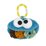 Sesame Street Cookie Monster On the Go plush toy with teether, clip, squeaky cookie, and crinkle donut for babies.