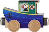 NameTrain Tugboat wooden toy with blue hull, natural wheels, and a puffin illustration in the cabin window.