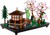 Icons Tranquil Garden miniature Japanese garden scene with pagoda cherry blossom trees and bridge