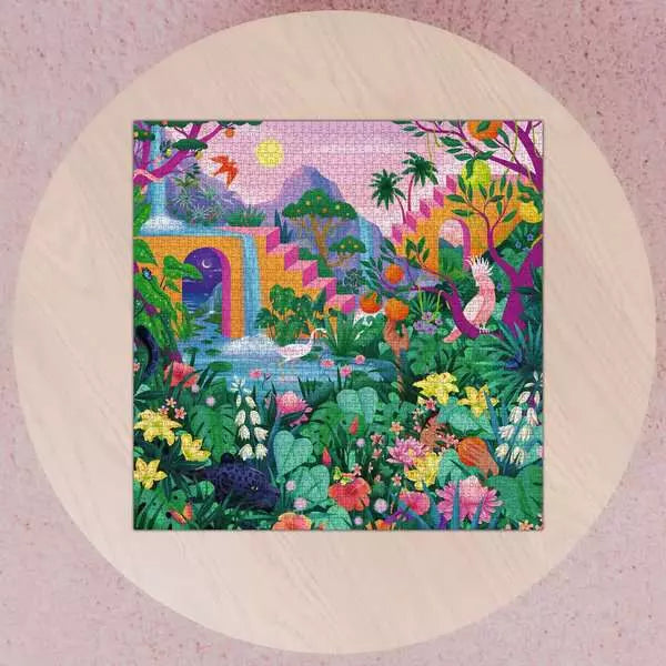 750pc Amazing Nature Puzzle showing a lush tropical garden with flowers, birds, waterfall, and colorful mountain scenery