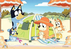 35pc Bluey at the Beach Puzzle featuring Bluey and family relaxing beside a beach tent and colorful sand toys