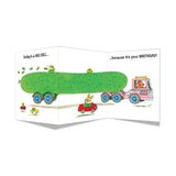Tri-fold birthday card with whimsical illustration of a large pickle on a truck and playful animals driving toys.
