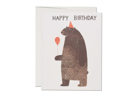 Birthday card featuring a standing bear wearing a party hat and holding a balloon with Happy Birthday text above.