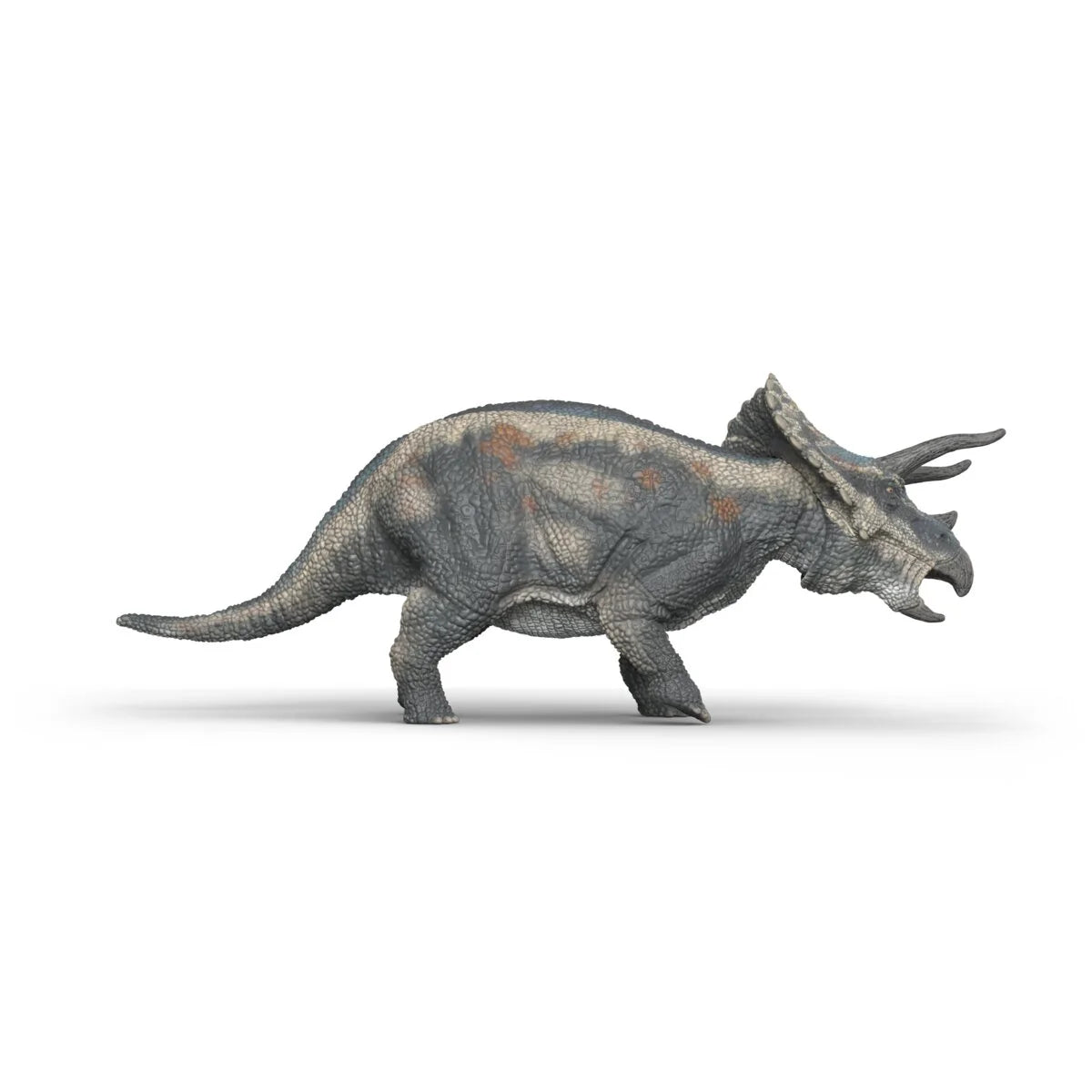 Triceratops dinosaur figure with textured gray skin and distinctive horns standing on a white background