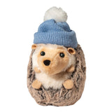Plush hedgehog toy wearing a cozy blue knit winter hat with a white pompom on top, soft and cuddly design.