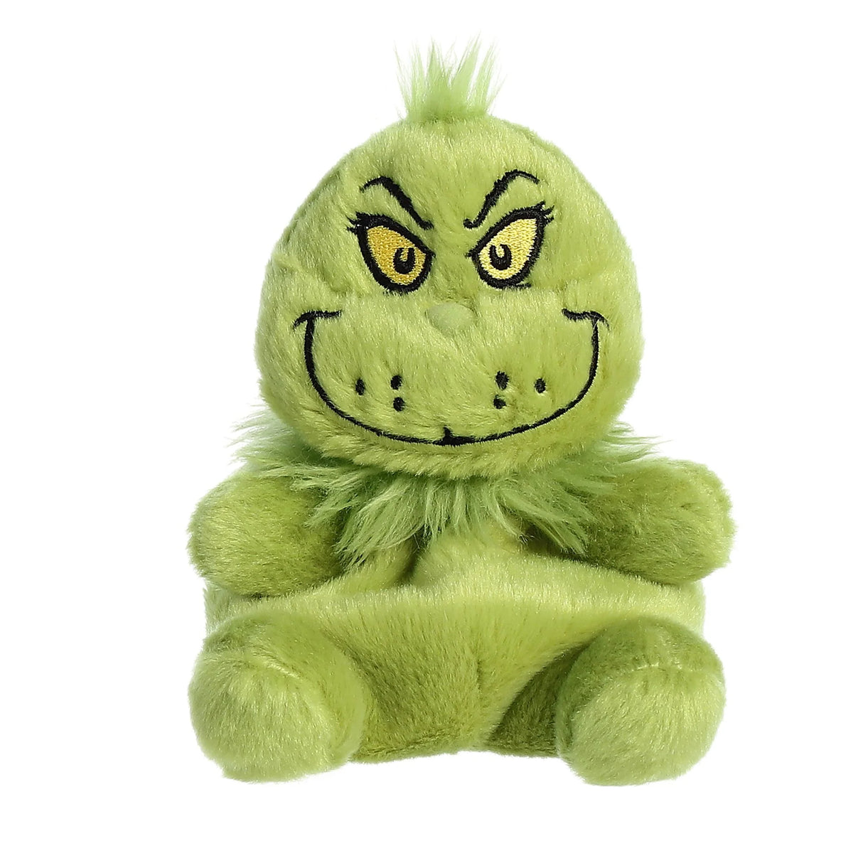 Soft green plush toy of a grumpy character with mischievous eyes and fuzzy texture sitting upright