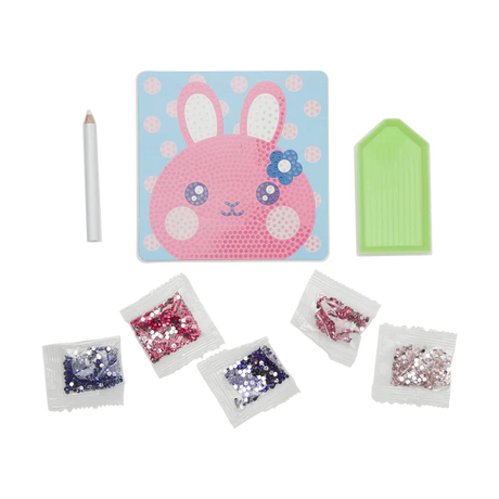 Razzle Dazzle Bouncy Bunny kit with bunny artwork, gem trays, wax pencil, and six gem packs for decorating.