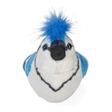 Plush bird toy with white and blue fur, black markings, and a fluffy blue feather tuft on its head