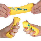 Easy Sqweezy Butter Mega yellow stretchy sensory toy being squeezed by hands
