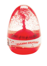 Volcanic Eruption toy showing simulated red lava eruption inside a clear dome for children ages 4 and up.