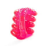 Tangle | Glow in the Dark playful red fidget toy with curved textured segments that twist and glow.
