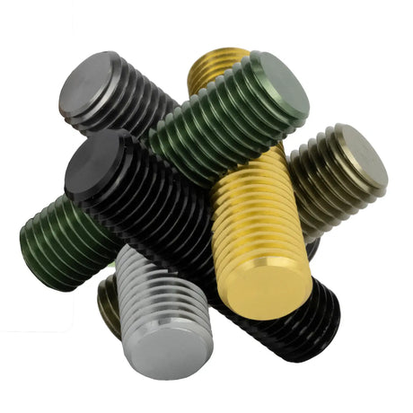 Close-up of colorful interlocked metal bolts forming a challenging brainteaser puzzle for ages eight and up.