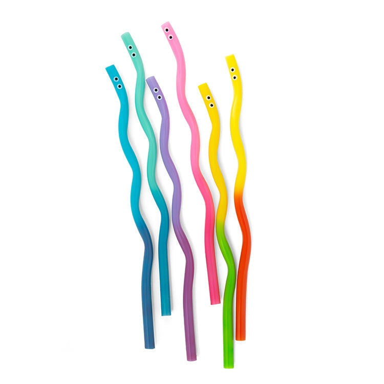 Six colorful wavy reusable straws in shades of blue, green, purple, pink, yellow, and orange with small eyes on top
