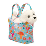 Pet Carrier Bichon Retro Chic with colorful toadstool and flower print tote holding a white plush Bichon puppy.