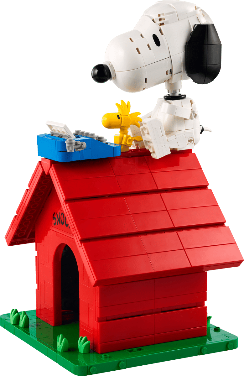 Ideas Peanuts: Snoopy's Doghouse featuring Snoopy and Woodstock atop a red doghouse