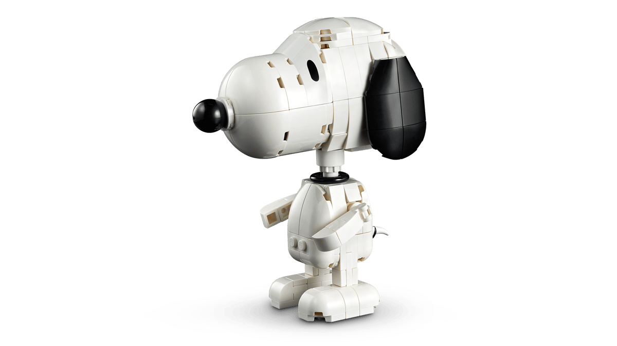 Ideas Peanuts: Snoopy's Doghouse featuring a white Snoopy robot figure