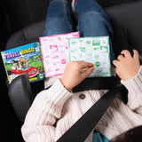 Travel Bingo game being played by a child in a car with colorful bingo cards