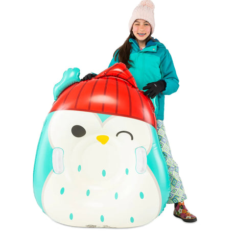 Snow Tube | Squishmallows Winston the Owl featuring a large inflatable owl sled with red beanie and sturdy handles.