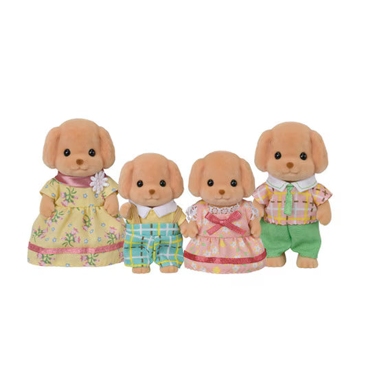 Toy Poodle Family toy figures in colorful clothing standing together