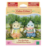 Citrus Bird Family toy set with two bird figures in colorful outfits displayed in a garden themed box