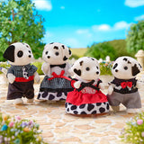 Dalmation Family plush dog family dressed in colorful outfits outdoors