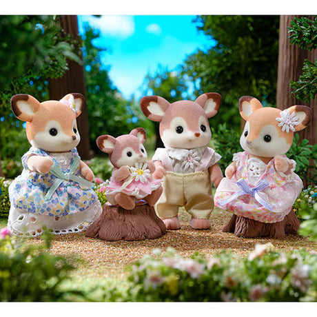 Deer Family deer figures in floral outfits gathered in a woodland setting