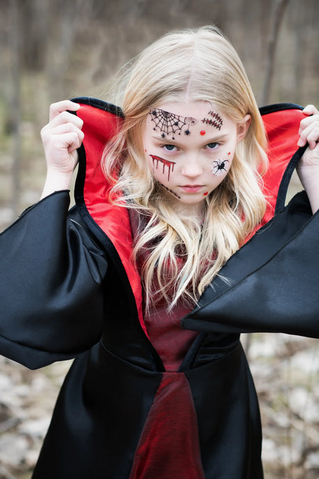 Vampire Dress | Size 5-6 featuring a black and red taffeta design with dramatic vampire collar and bat detail on chest.