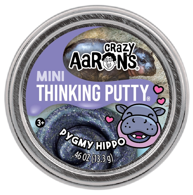 Round tin of dark glittery putty with purple label featuring a smiling cartoon hippo and hearts design