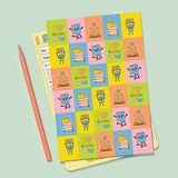 Colorful sticker sheet with book and reading-themed characters on top of a playful guided reading reflection pad
