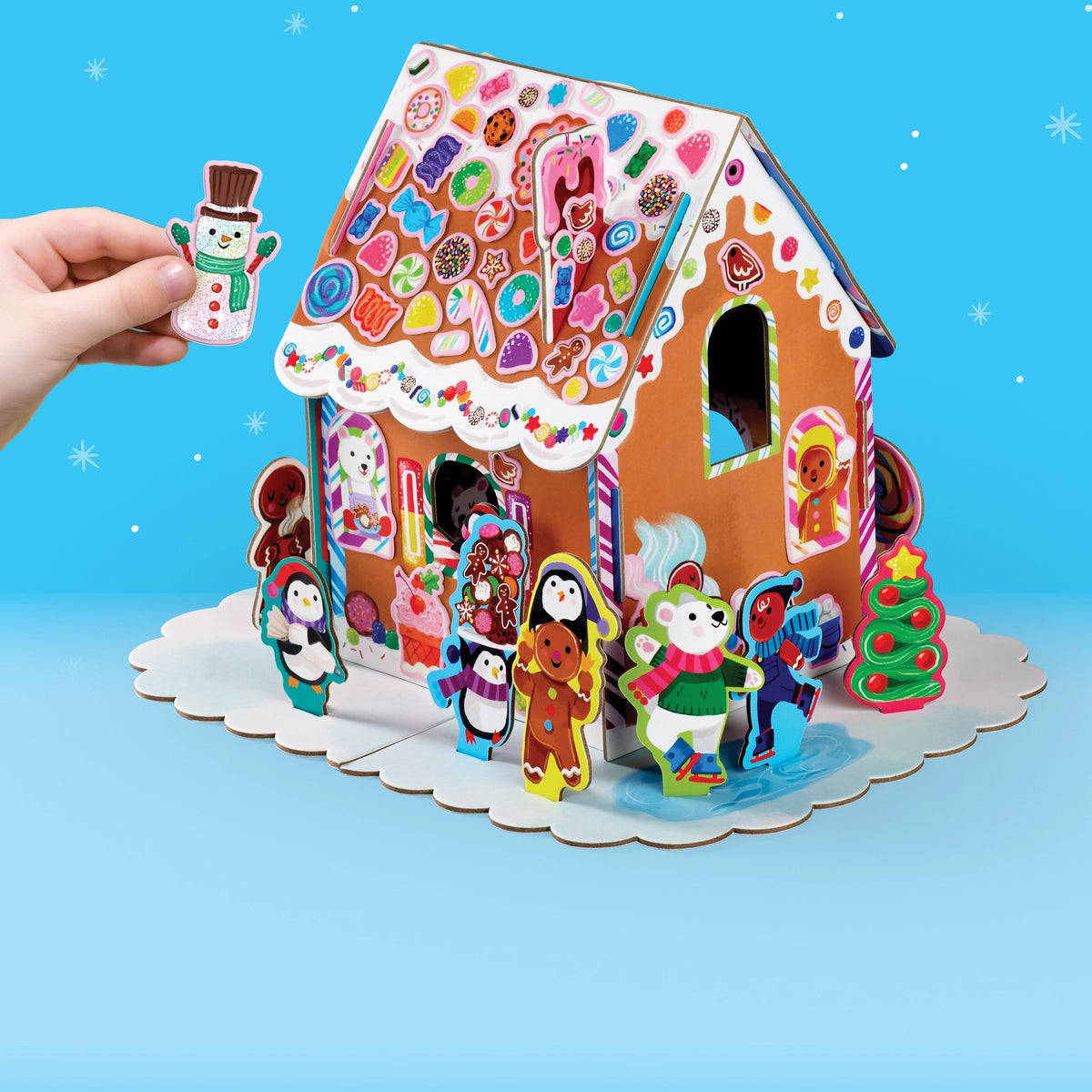 Make Your Own Gingerbread House with colorful candy decorations and festive holiday characters