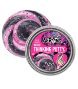 Mini black putty with pink and silver glitter that changes to vibrant pink when touched in a small round tin container.