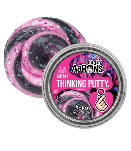 Mini black putty with pink and silver glitter that changes to vibrant pink when touched in a small round tin container.