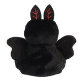 Soft black plush Mothman Mortimer with red stitched ears and outstretched wings, facing away from view
