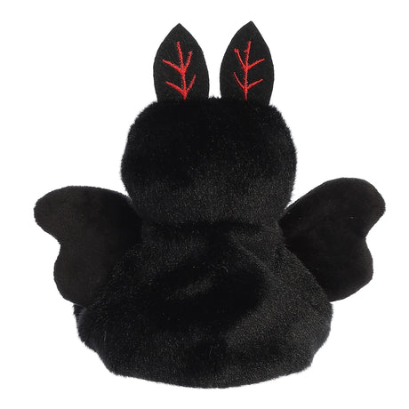 Soft black plush Mothman Mortimer with red stitched ears and outstretched wings, facing away from view