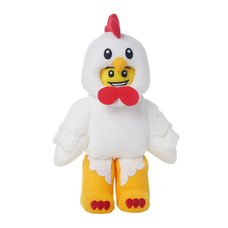 Soft plush toy dressed as a white chicken with red comb and yellow beak and feet featuring a smiling face inside