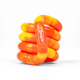 Bright orange and yellow spiral fidget toy designed to enhance creativity and focus for kids and adults