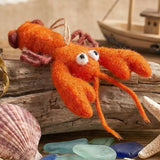 Louella Lobster Felt Ornament featuring an orange felt lobster with googly eyes and dangling claws