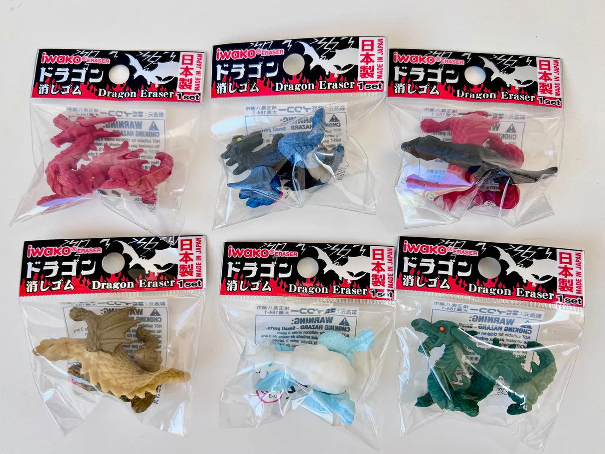 Sets of colorful Japanese dragon puzzle erasers individually packaged and crafted with detailed design.