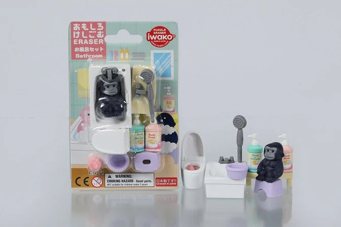 Japanese puzzle eraser set with bathroom-themed pieces including shower, toilet, and gorilla figure, eco-friendly and handmade