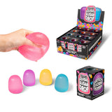 Scrunchems Squishy Sugar Drop colorful squishy toys shown with display box