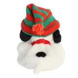 Plush Snoopy wearing a red and green striped knitted hat with a red collar, seen from behind