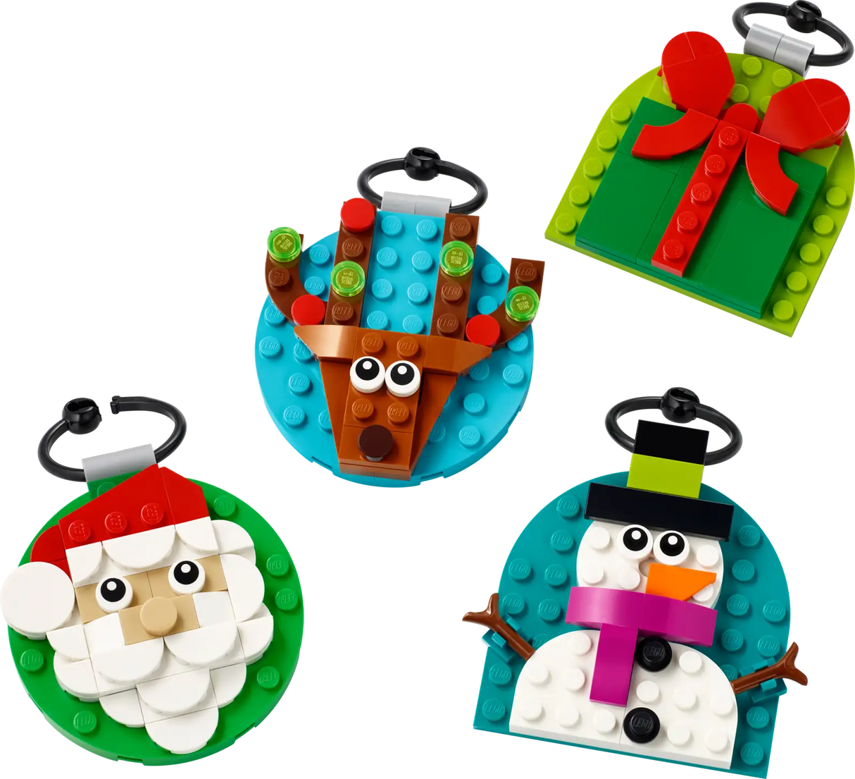 Colorful building block ornaments shaped like Santa, reindeer, snowman, and a gift with a bow on round bases